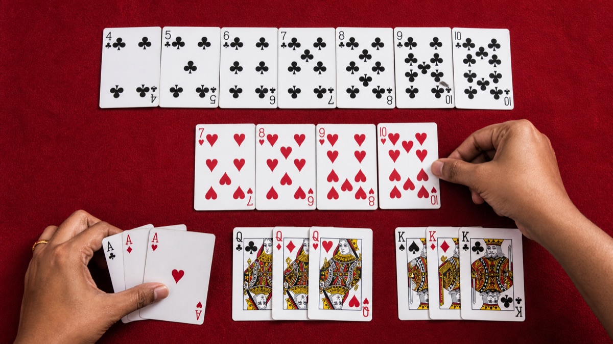 Thirteen cards arranged into Indian Rummy sequences and sets